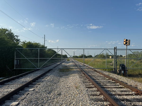 50' commercial grade cantilever chain-link gate installation in Denton!